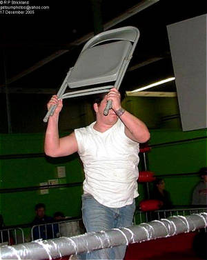 greasewithchair.jpg